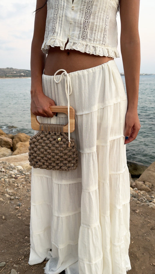 Handmade Koma Bag in Sand, made from 100% recycled cotton cord with wooden handles