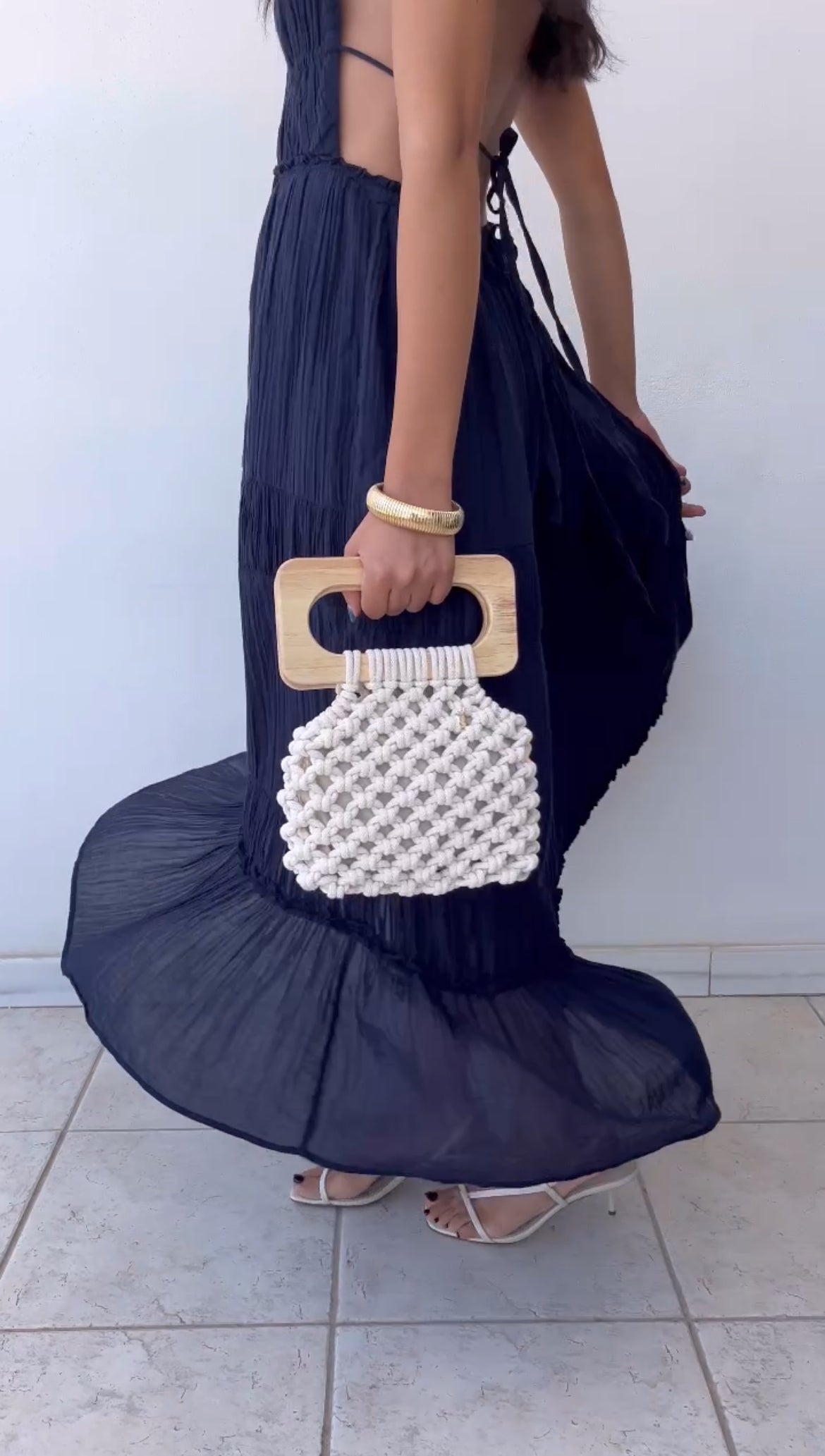 Swirling around with the Koma Bag in Natural, styled with a navy blue flowy dress, very boho chic.
