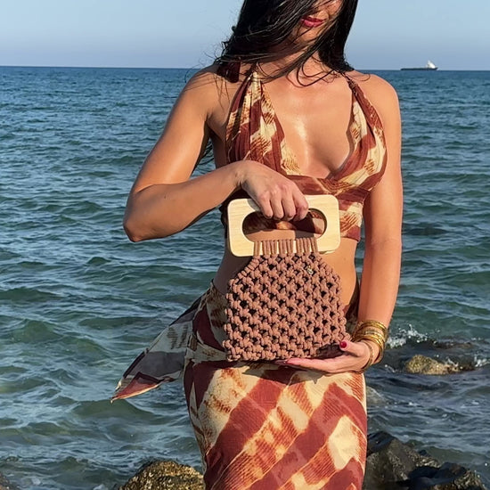 woman with koma bag in mocha mousse